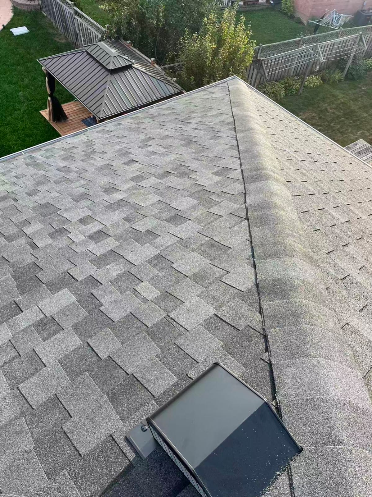 Finished shingle roof, aerial view